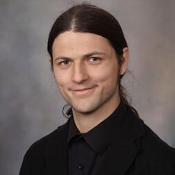 Mikolaj Ogrodnik headshot